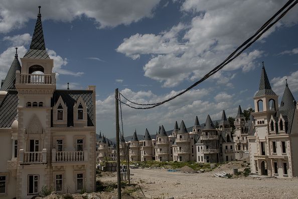 Burj Al Babas MUDURNU, TURKEY - MAY 21: Hundreds of castle-like villas and houses are seen unfinished at the Burj Al Babas housing development on May 21, 2019 in Mudurnu, Turkey. Construction on the luxury housing project began in 2014 and aimed to build 732 villas, a shopping mall and entertainment facilities targeted at foreign buyers. However the future of the villas is now uncertain after the developers, Sarot Property Group filed for bankruptcy after buyers and investors pulled out of the 150million euro project. The economic downturn and weakening Turkish lira have left many companies unable to pay large foreign currency debts borrowed to finance projects, resulting in many companies filing for bankruptcy and leaving projects unfinished. (Photo by Chris McGrath/Getty Images)
