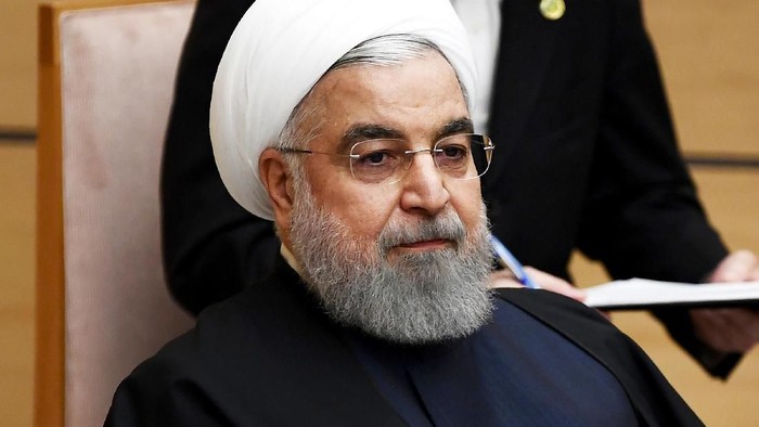 FILE - In this Dec. 20, 2019, file photo, Iranian President Hassan Rouhani attends a meeting with Japanese Prime Minister Shinzo Abe during a meeting at the prime ministers office in Tokyo.  Iran on Saturday, Jan. 11, 2020, acknowledged that its armed forces â€œunintentionallyâ€ shot down the Ukrainian jetliner that crashed earlier this week, killing all 176 aboard, after the government had repeatedly denied Western accusations that it was responsible. (Charly Triballeau/Pool Photo via AP, File)
