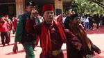 Berbaju Pangsi, Massa Pro-Anies Gelar Aksi di Balai Kota DKI