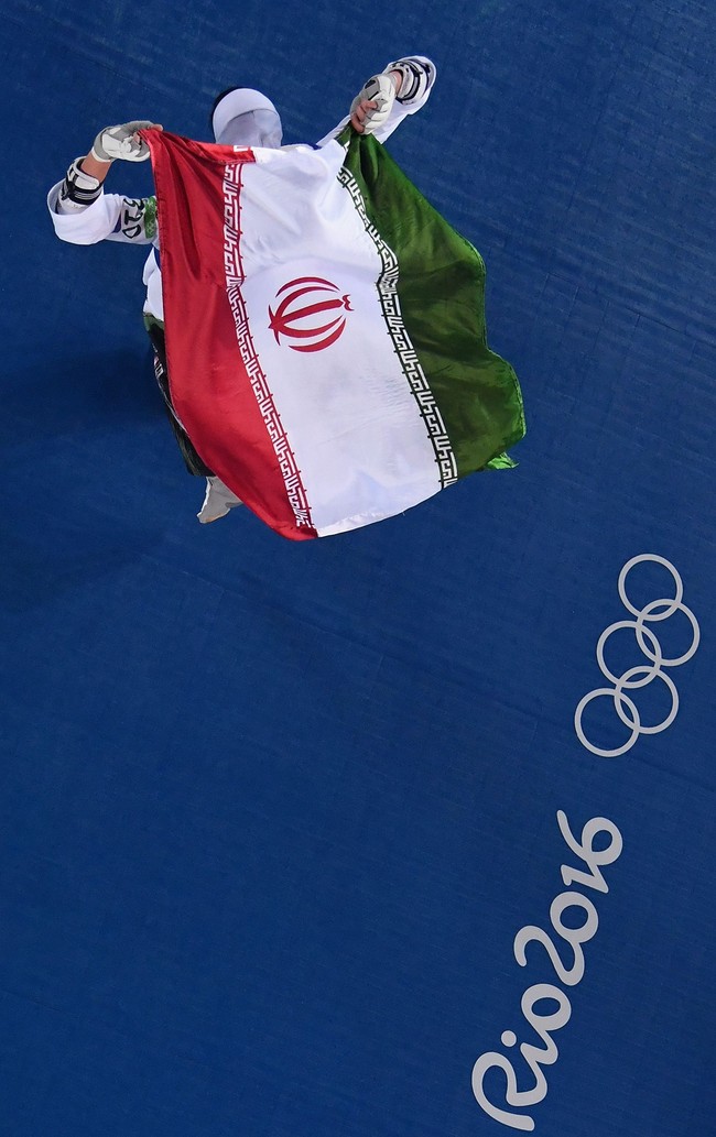 Kantor berita semi-resmi Iran, Isna, membuat laporan yang menyebut: Kejutan bagi taekwondo Iran. Kimia Alizadeh telah beremigrasi ke Belanda. Alizadeh diyakini kini sedang berlatih di Belanda untuk tampil di Olimpiade Tokyo 2020. Namun, Iran sudah tidak lagi berada di bawah bendera Iran. (Foto: Richard Heathcote/Getty Images)