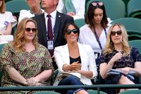 Meghan Markle bersama rekannya di Wimbledon 2019.