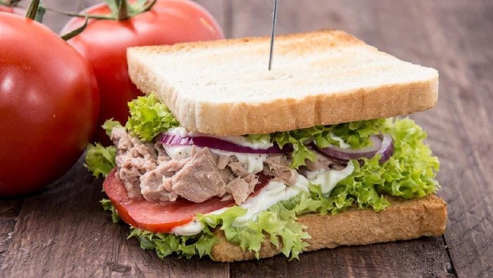 Fresh made Tuna Sandwiches on wooden background