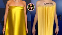 Melihat J.Lo mengenakan dress kuning, Emi juga tak mau kalah. Tapi kali ini ia malah memanfaatkan spagheti. Pasta Party Outfit, kata Emi. Foto: instagram @emilife