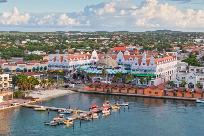Oranjestad, Aruba - December 01, 2011: View from above of colorful buildings in Oranjestad on the island of Aruba in the morning sun at December 01, 2011.