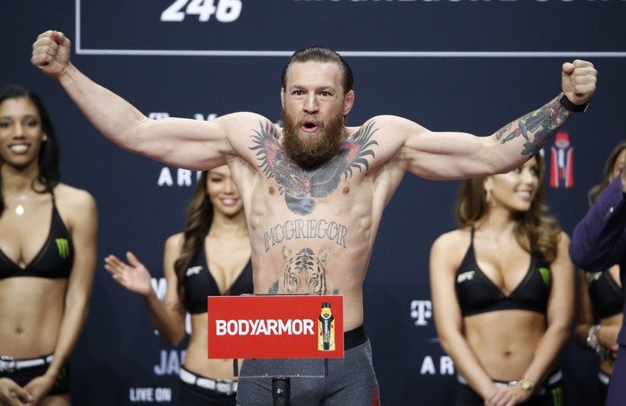 Conor McGregor poses during a ceremonial weigh-in for the UFC 246 mixed martial arts bout, Friday, Jan. 17, 2020, in Las Vegas. McGregor is scheduled to fight Donald 