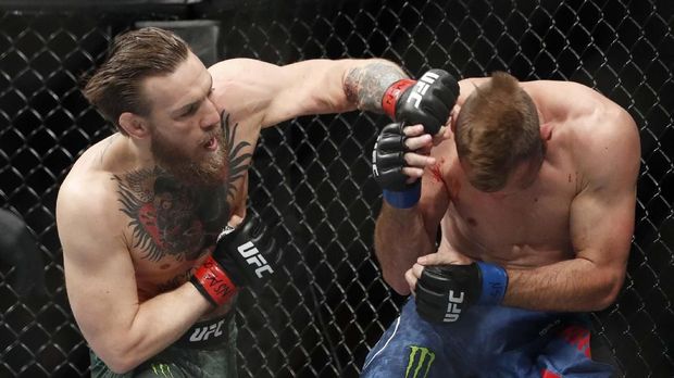 Conor McGregor saat mengalahkan Cowboy Cerrone dalam waktu 40 detik. (