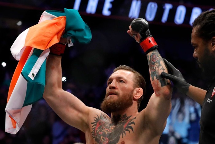 LAS VEGAS, NEVADA - JANUARY 18:  Conor McGregor celebrates after defeating Donald Cerrone in a welterweight bout during UFC246 at T-Mobile Arena on January 18, 2020 in Las Vegas, Nevada. McGregor won by a TKO in the first round. (Photo by Steve Marcus/Getty Images)