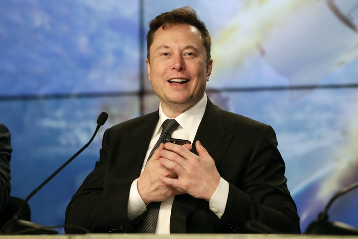 Elon Musk founder, CEO, and chief engineer/designer of SpaceX speaks during a news conference after a Falcon 9 SpaceX rocket test flight to demonstrate the capsules emergency escape system at the Kennedy Space Center in Cape Canaveral, Fla., Sunday, Jan. 19, 2020. (AP Photo/John Raoux)