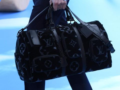 PARIS, FRANCE - JANUARY 16: A model,bag detail, walks the runway during the Louis Vuitton Menswear Fall/Winter 2020-2021 show as part of Paris Fashion Week on January 16, 2020 in Paris, France. (Photo by Pascal Le Segretain/Getty Images)