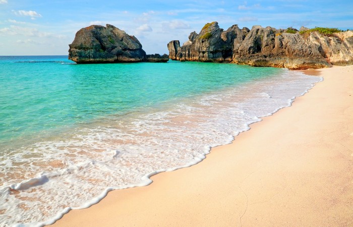 Beautiful beach with waves in Warwick Long Bay in Bermuda