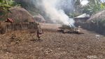 Foto: Tradisi Bakar Jenazah dan Potong Jari Papua