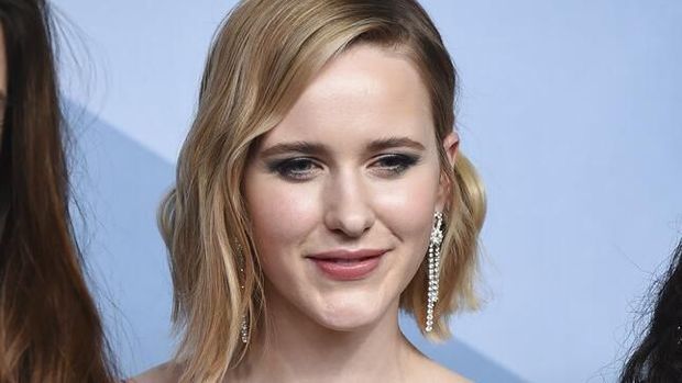 Rachel Brosnahan poses in the press room with the award for outstanding performance by an ensemble in a comedy series for 
