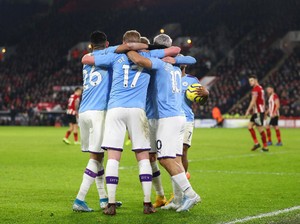 Penampilan Solid Man City