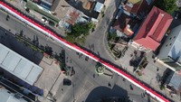 Pembentangan kain merah putih dalam rangka Hari Patriotik Provinsi Gorontalo ke-78 tersebut meraih rekor MURI dengan panjang kain 2.300 meter dan lebar 3 meter.
