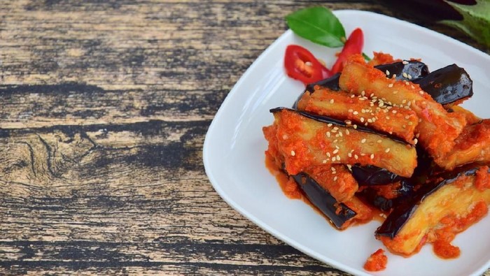 1190896389 Terong Balado, Indonesian food. Fried eggplant with chili sauce