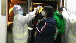 Cegah Virus Corona, Warga Dunia Mudik Jelang Imlek Pakai Masker