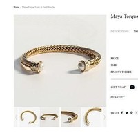 Gelang emas yang dipakai Kate Middleton masih dijual di situs resmi Halcyon Days. Berminat beli? (Foto: Eddie Keogh-WPA Pool/Getty Images)