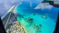 Tuvalu merupakan salah satu negara termiskin di dunia. Negara in merdeka dari jajahan Inggris pada tahun 1978 dengan bahasa nasionalnya Bahasa Inggris. Ini adalah negara Oseania yang berada di antara Hawaii dan Australia di Samudera Pasifik. (iStock)