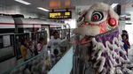 Barongsai Hibur Penumpang LRT Jakarta