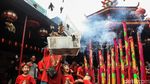 Tradisi Melepas Burung Pipit Saat Imlek
