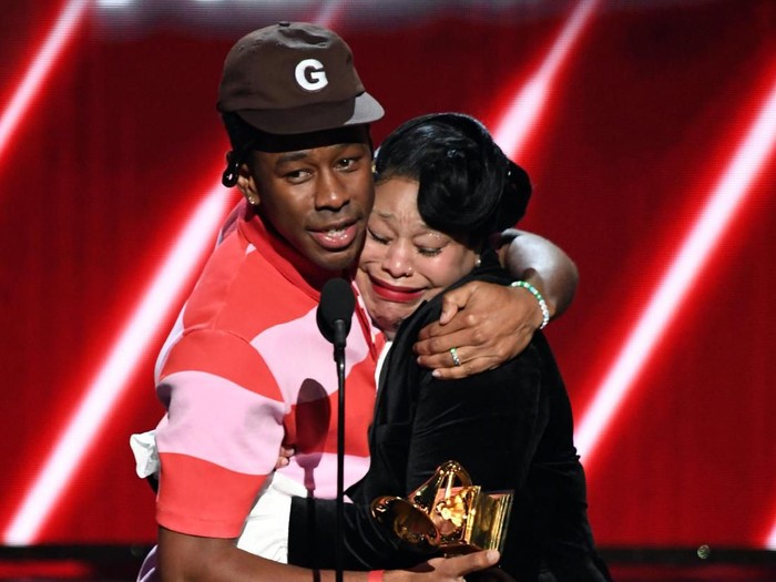 LOS ANGELES, CALIFORNIA - JANUARY 26: (L-R) Tyler, the Creator and his mother accept the Best Rap Album award for Igor onstage during the 62nd Annual GRAMMY Awards at STAPLES Center on January 26, 2020 in Los Angeles, California. (Photo by Kevin Winter/Getty Images for The Recording Academy )
