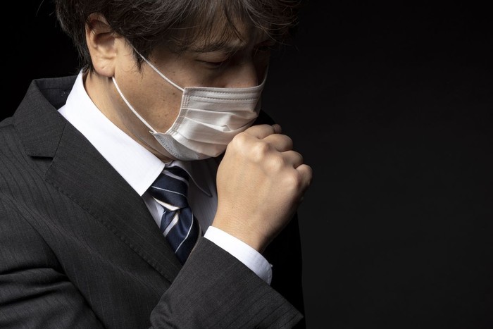 Businessman wearing a medical mask