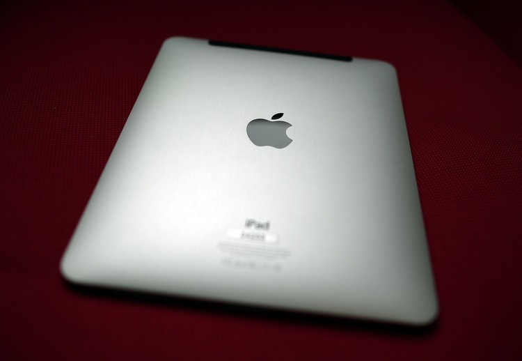 LONDON, ENGLAND - FEBRUARY 17:  In this photo illustration, a man holds an Apple ipad tablet on February 17, 2011 in London, England. Apple sold two million ipads in the first two months of their launch in 2010. Worldwide iPad sales are expected to amount to 20 million in 2012.  (Photo Illustration by Peter Macdiarmid/Getty Images)
