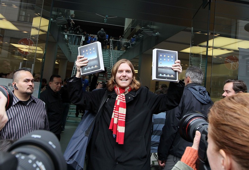 SAN FRANCISCO - APRIL 03:  Apple customer Andres Schobel holds up his two new iPads at an Apple store April 3, 2010 in San Francisco, California. Hundreds of people lined up hours before the Apple store opened to purchase the new iPad which debuted today.  (Photo by Justin Sullivan/Getty Images)