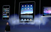 SAN FRANCISCO - JANUARY 27: Apple Inc. CEO Steve Jobs holds up the new iPad as he speaks during an Apple Special Event at Yerba Buena Center for the Arts January 27, 2010 in San Francisco, California. Apple introduced its latest creation, the iPad, a mobile tablet browsing device that is a cross between the iPhone and a MacBook laptop. (Photo by Justin Sullivan/Getty Images)