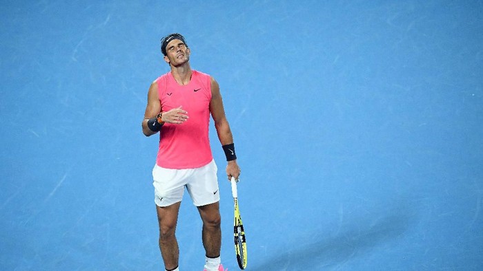 MELBOURNE, AUSTRALIA - JANUARY 29: Rafael Nadal of Spain reacts during his Menâ€™s Singles Quarterfinal match against Dominic Thiem of Austria on day ten of the 2020 Australian Open at Melbourne Park on January 29, 2020 in Melbourne, Australia. (Photo by Hannah Peters/Getty Images)