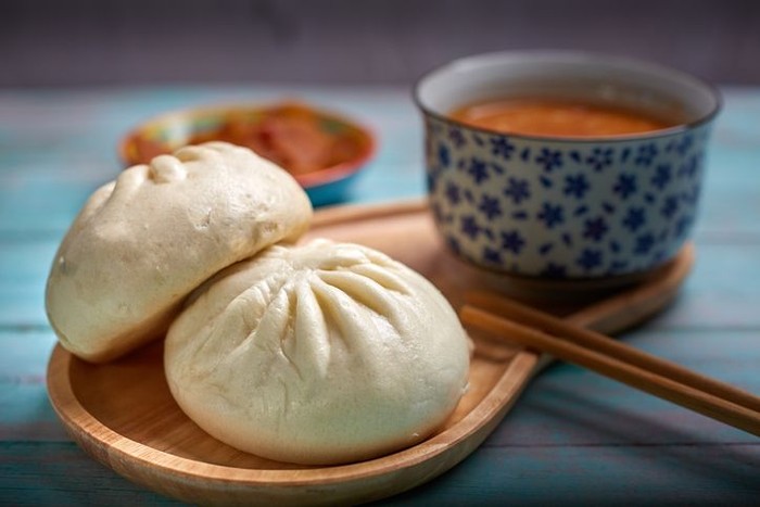 Traditional spicy asian soup with tofu cheese and noodles. This dish usually contains bouillon and vegetables