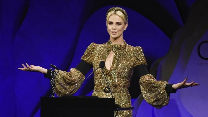 Actress Charlize Theron accepts the Spotlight Award during the 22nd Annual Costume Designers Guild Awards at the Beverly Hilton, Tuesday, Jan. 28, 2020, in Beverly Hills, Calif. (AP Photo/Chris Pizzello)