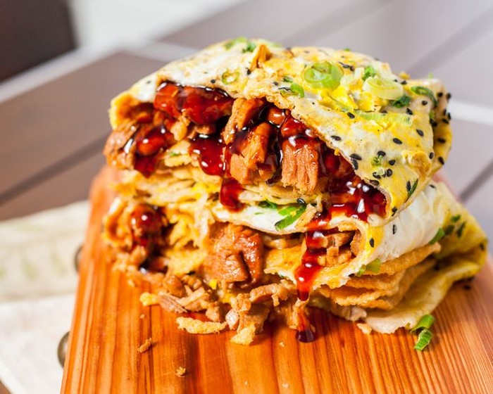 Traditional spicy asian soup with tofu cheese and noodles. This dish usually contains bouillon and vegetables