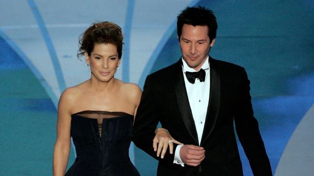 Sandra Bullock dan Keanu Reeves di Oscar 2006.