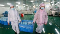 Untuk membantu memerangi wabah pneumonia yang disebabkan oleh coronavirus baru, pekerja di Guangxi harus bergegas kembali bekerja usai tahun baru Imlek. Foto: Dok. Xinhua/Lu Boan