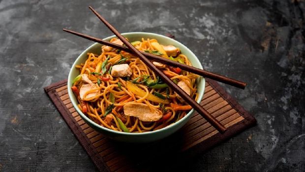 mie or bakmi ayam. seasoned yellow wheat noodles topped with diced chicken meat