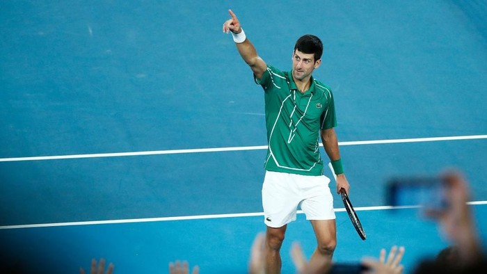 MELBOURNE, AUSTRALIA - FEBRUARY 02: Novak Djokovic of Serbia celebrates winning championship point after his Mens Singles Final against Dominic Thiem of Austria on day fourteen of the 2020 Australian Open at Melbourne Park on February 02, 2020 in Melbourne, Australia. (Photo by Daniel Pockett/Getty Images)
