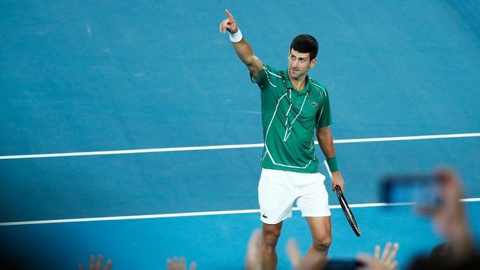 Novak Djokovic MELBOURNE, AUSTRALIA - FEBRUARY 02: Novak Djokovic of Serbia celebrates winning championship point after his Mens Singles Final against Dominic Thiem of Austria on day fourteen of the 2020 Australian Open at Melbourne Park on February 02, 2020 in Melbourne, Australia. (Photo by Daniel Pockett/Getty Images)