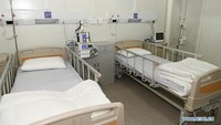 Foto salah satu kamar pasien di dalam RS Huoshenshan ini dijepret pada Minggu (2/2) waktu setempat. Foto: Xinhua/Chen Yehua