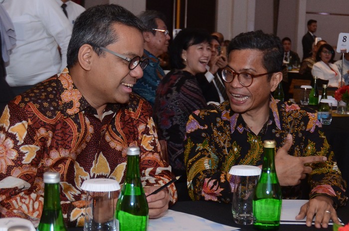 Direktur Utama PT Bank Tabungan Negara (Persero) Tbk. Pahala N. Mansury bersama Wakil Menteri Keuangan Indonesia Suahasil Nazara di sela acara BTN Market Outlook 2020, di Jakarta, Senin (3/1). Bank BTN fokus pada oembiayaan rumah untuk mendukung perekonomian nasional dengan tetap berhati-hati mengingat kondisi geo politik dan ekonomi yang masih belum menentu di tahun tikus logam.