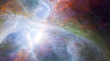 Bintang-bintang baru yang tersembuny di gas dan awan di konstelasi Orion. Diabadikan oleh Spitzer Space Teleskop  Foto: ESA/NASA/JPL-Caltech/N. Billot (IRAM) via AP.  