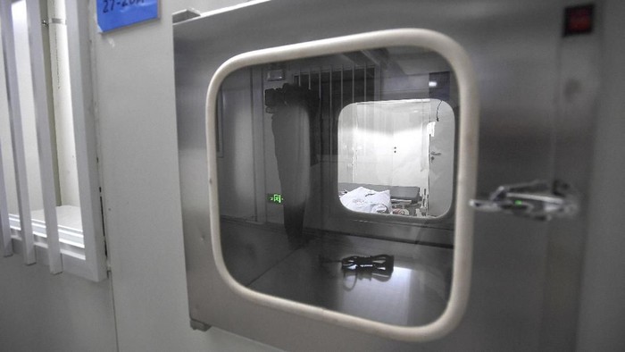 An isolation unit is seen at the Huoshenshan temporary field hospital in Wuhan in central Chinas Hubei Province, Sunday, Feb. 2, 2020. The Philippines on Sunday reported the first death from a new virus outside of China, where authorities delayed the opening of schools in the worst-hit province and tightened quarantine measures in a city that allow only one family member to venture out to buy supplies. (Chinatopix via AP)
