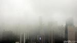Kabut Selimuti Gedung Pencakar Langit di Jakarta