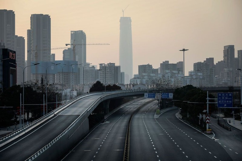 WUHAN, CHINA - FEBRUARY 03:  (CHINA OUT) A person wears a protective mask as he walks down an empty street on February 3, 2020 in Wuhan, Hubei province, China. The number of those who have died from the Wuhan coronavirus, known as 2019-nCoV, in China climbed to 361 and cases have been reported in other countries including the United States, Canada, Australia, Japan, South Korea, India, the United Kingdom, Germany, France, and several others.  (Photo by Getty Images)