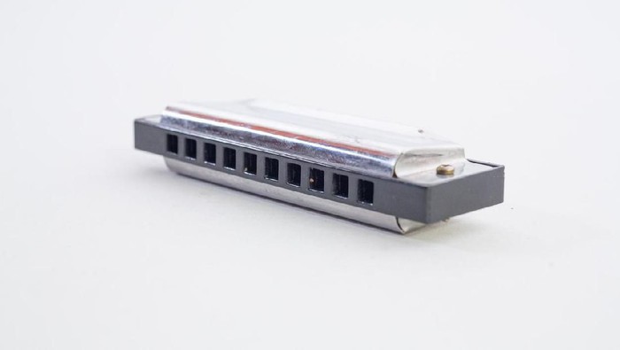 harmonica close-up on a white background