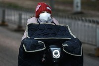 WUHAN, CHINA - FEBRUARY 03:  (CHINA OUT) A person wears a protective mask as he walks down an empty street on February 3, 2020 in Wuhan, Hubei province, China. The number of those who have died from the Wuhan coronavirus, known as 2019-nCoV, in China climbed to 361 and cases have been reported in other countries including the United States, Canada, Australia, Japan, South Korea, India, the United Kingdom, Germany, France, and several others.  (Photo by Getty Images)