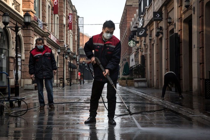 WUHAN, CHINA - FEBRUARY 03:  (CHINA OUT) A person wears a protective mask as he walks down an empty street on February 3, 2020 in Wuhan, Hubei province, China. The number of those who have died from the Wuhan coronavirus, known as 2019-nCoV, in China climbed to 361 and cases have been reported in other countries including the United States, Canada, Australia, Japan, South Korea, India, the United Kingdom, Germany, France, and several others.  (Photo by Getty Images)