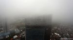 Kabut Selimuti Gedung Pencakar Langit di Jakarta