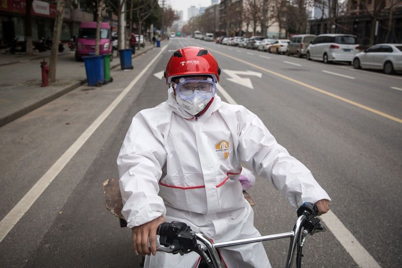 WUHAN, CHINA - FEBRUARY 03:  (CHINA OUT) A person wears a protective mask as he walks down an empty street on February 3, 2020 in Wuhan, Hubei province, China. The number of those who have died from the Wuhan coronavirus, known as 2019-nCoV, in China climbed to 361 and cases have been reported in other countries including the United States, Canada, Australia, Japan, South Korea, India, the United Kingdom, Germany, France, and several others.  (Photo by Getty Images)