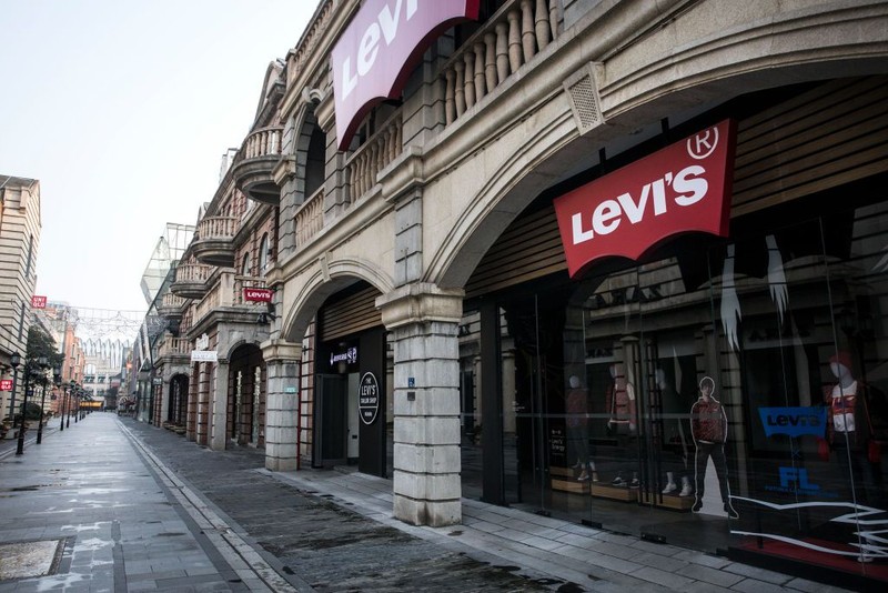 WUHAN, CHINA - FEBRUARY 03:  (CHINA OUT) A person wears a protective mask as he walks down an empty street on February 3, 2020 in Wuhan, Hubei province, China. The number of those who have died from the Wuhan coronavirus, known as 2019-nCoV, in China climbed to 361 and cases have been reported in other countries including the United States, Canada, Australia, Japan, South Korea, India, the United Kingdom, Germany, France, and several others.  (Photo by Getty Images)